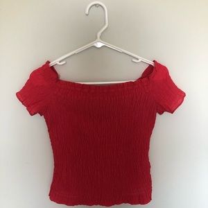 smocked red shirt
